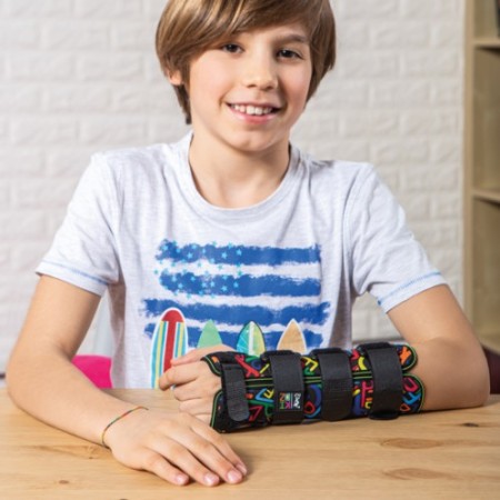 FGP DTX03 K - Linea Kidz polsiera pediatrica steccata lunga cm.16